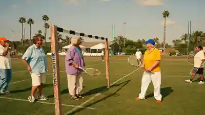 Active adults playing pickleball on an outdoor court at a Florida community