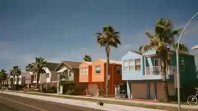Florida beach town street of pastel cottages and small rental bungalows with bicycles outside